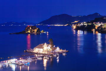 Blue hour at Kanoni village in Corfu island in Greece. View from the top. A famous touristic destination. 
