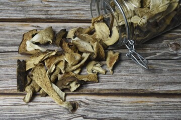 Wild mushrooms mix in jar.