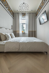 Modern Cozy Bedroom with Soft Lighting and TV