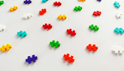 Colorful jigsaw puzzle pieces on white background