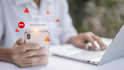 Hand Holding Smartphone With Virtual Scam Call Alert Interface