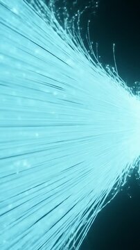 Abstract image of light blue, radiating fiber optic strands.
