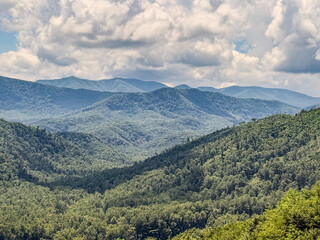 Great Smoky Mountains vista on a summer day with blue skies and white clouds