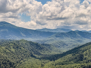 Great Smoky Mountains vista on a summer day with blue skies and white clouds