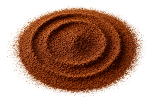 Cocoa powder artfully scattered in a circular shape on a ceramic surface.