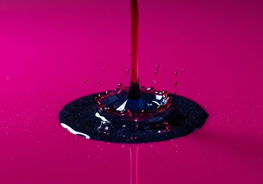 Vibrant Magenta Stream Creates a Glittering Cosmic Crown Splash - Powered by Adobe