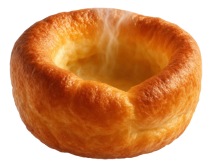 Fluffy Yorkshire pudding, steam accentuating the hollow center.
