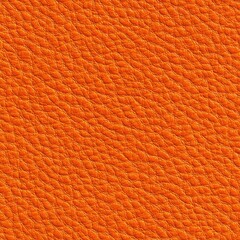Close-up of vibrant orange textured fabric with a pebbled, diagonally oriented pattern suggesting leather or leatherette