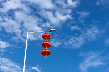 The red lanterns on the street lamps
