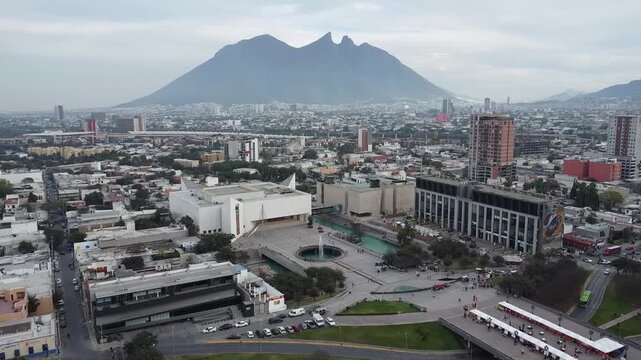view of macroplaza of monterrey on a quiet day, with the cerro de la silla on the horizon in Mexico