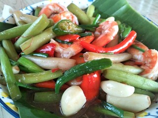 Thai Lotus Stem Stir-fry with Shrimp – Traditional Stir-fried Vegetable Dish with Chili and Garlic on Banana