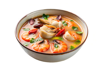 Close up of a bowl of tom yum soup with shrimp and vegetables on a white background
