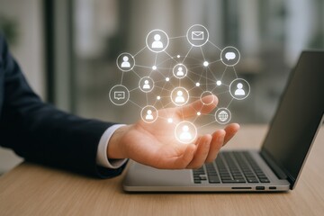 Digital Network Connection Technology Concept: Businessman Holding Holographic Social Media Interface with Laptop