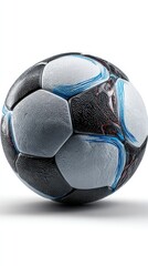 Close-up of a black and white soccer ball with light blue accents