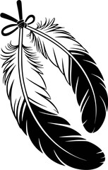 Obraz premium Black feathers tied with ribbon quill plume