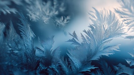 Intricate ice patterns glisten in soft blue hues, creating a delicate and ethereal winter wonderland.