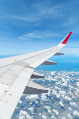 Obraz premium Awesome view of the Earth under the airplane wing