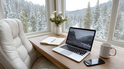 Cozy workspace with a snowy mountain view creating a perfect winter atmosphere