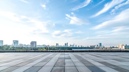 Expansive urban cityscape panorama with a vast tiled plaza in the foreground under a bright blue sky with wispy clouds