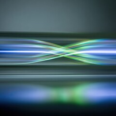 Abstract, vibrant, light streaks intertwine across a dark background