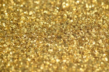 Macro image of tiny pieces of gold.