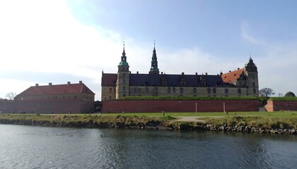 Fototapeta premium Ancient european castle complex by water