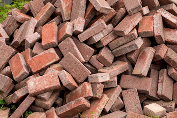 Random Pile of Reclaimed Paving Blocks Closeup View