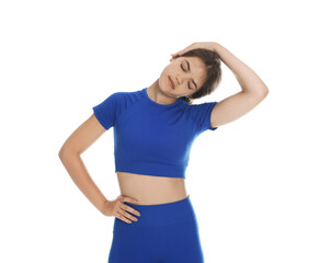 Fototapeta premium Teenage girl in sportswear stretching on white background