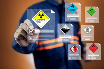 dangerous goods concept with safety staff tick checkmark on radioactive data sheet and each...