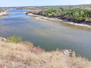 View from above of the old Dnieper channel that has become shallow in the dry summer.