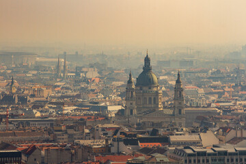Aerial View of Historic Dome and Cityscape in Hazy Light
