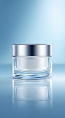 Clear glass jar with silver lid, containing white cream, reflected on a blue surface