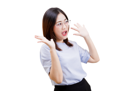 A surprised Asian young beautiful woman with glasses displays an expressive gesture, combining shock and playfulness in her pose.