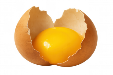 Brown egg cracking, revealing golden yolk against transparent backdrop