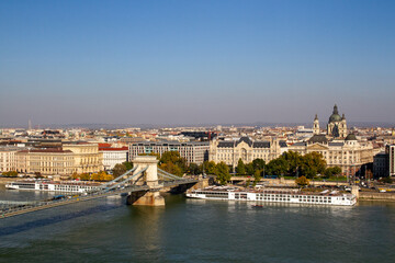 Panoramic View of Chain Bridge and Historic Buildings Along River
