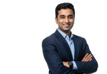 Young South Asian man, dark blue suit, light blue shirt, arms crossed, confident smile, direct eye contact, bright white studio, copy space, for professional leadership concept