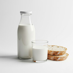 A cold glass of fresh milk sits beside a healthy breakfast drink bottle and a dairy pitcher