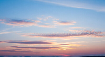 Fototapeta premium Serene and Pastel Colored Cloudscape at Sunrise, Romantic Sky Above Horizon