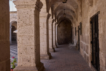 The Cloisters of the Company showcase elegant colonial architecture carved from white volcanic sillar. Once part of a Jesuit complex, these arcaded courtyards now blend history and art.