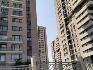 Modern apartment buildings with blue sky background