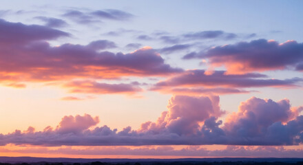 Fototapeta premium Soft Light and Pastel Colored Cumulus Clouds at Sunset Landscape