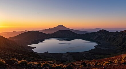 Majestic Volcanic Crater Lake at Sunrise with Distant Cone Peak
