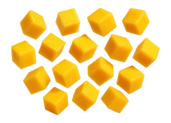 Brightly scattered diced mango pieces.