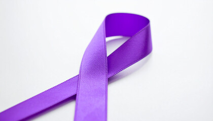 Purple awareness ribbon on white backdrop. Symbol of pancreatic cancer and epilepsy.