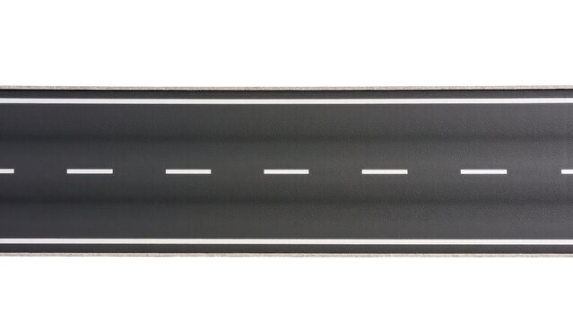 Aerial view of straight asphalt road with white lane markings, creating sense of openness and tranquility