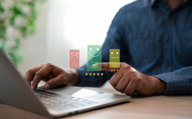 A user give rating to service experience on laptop online application, Evaluate quality of service leading to reputation ranking of business. Customer review satisfaction feedback survey concepts.