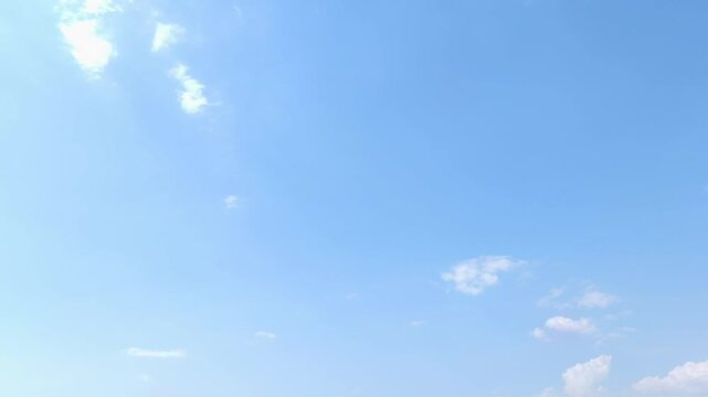 Very bright blue sky with some clouds