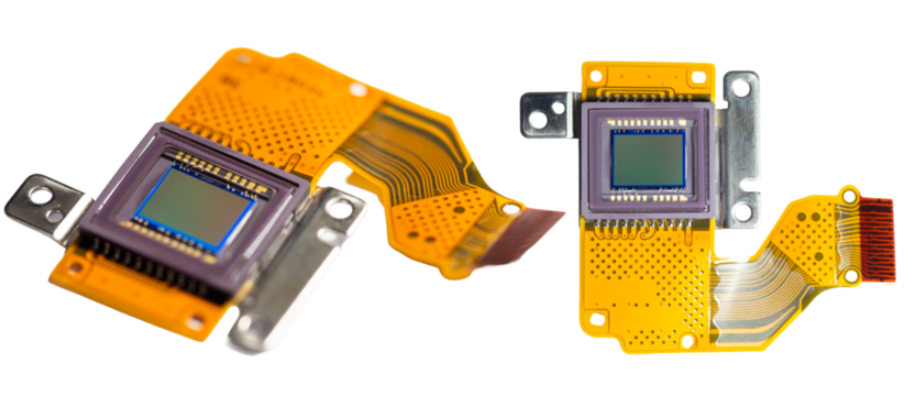 Image sensor spare parts in a digital camera on a white background.