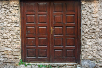 Dark Brown Wooden Door with Square Pattern &ndash; Entrance of Old Macedonian Traditional House