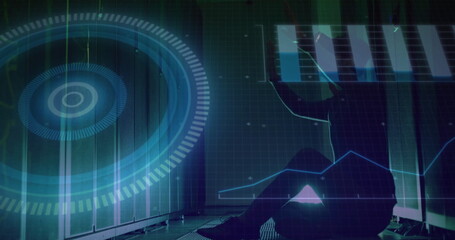 Crouching technician inspecting server cabinets in corridor with holographic overlays, copy space